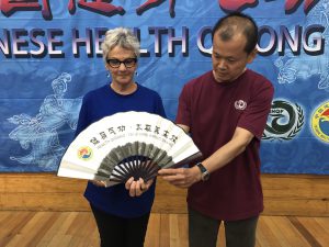 Presentation of fan to club by Chinese delegation representative